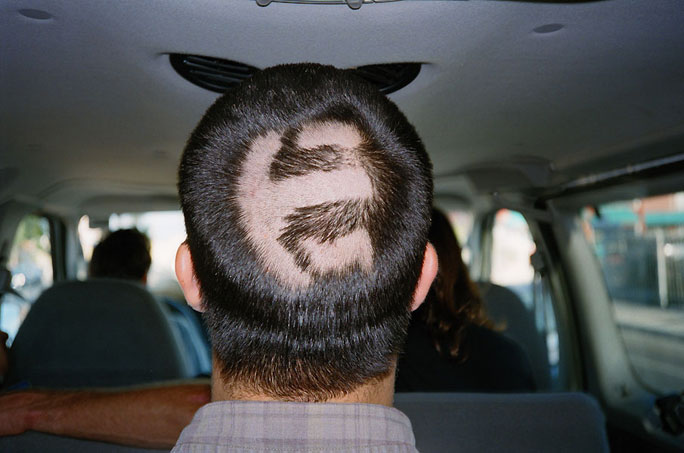 Benny Maglinao – Etnies logo shaved into his head on KOTR